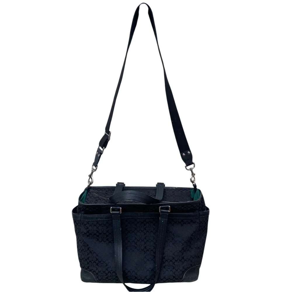 Coach Black Baby Bag with Textured Material and Sturdy Handles signature